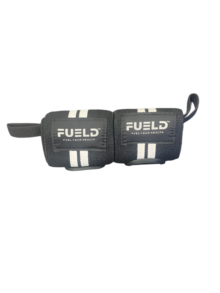 Pair of black wrist wraps with 'FUELD' branding on a dark background