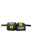 Two black wrist wraps with yellow accents and 'FUEL' branding on a metallic surface.